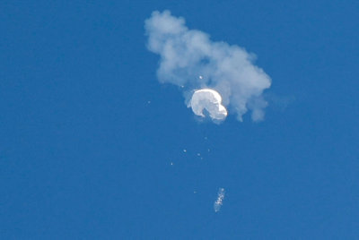 FILE PHOTO: The suspected Chinese spy balloon drifts to the ocean after being shot down off the coast in Surfside Beach