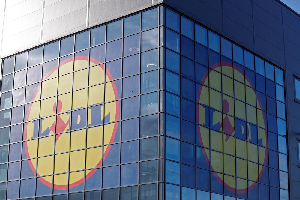 FILE PHOTO: Lidl''s logos are seen on the exterior of its new Scottish distribution centre as it commences operations in Motherwell, Scotland