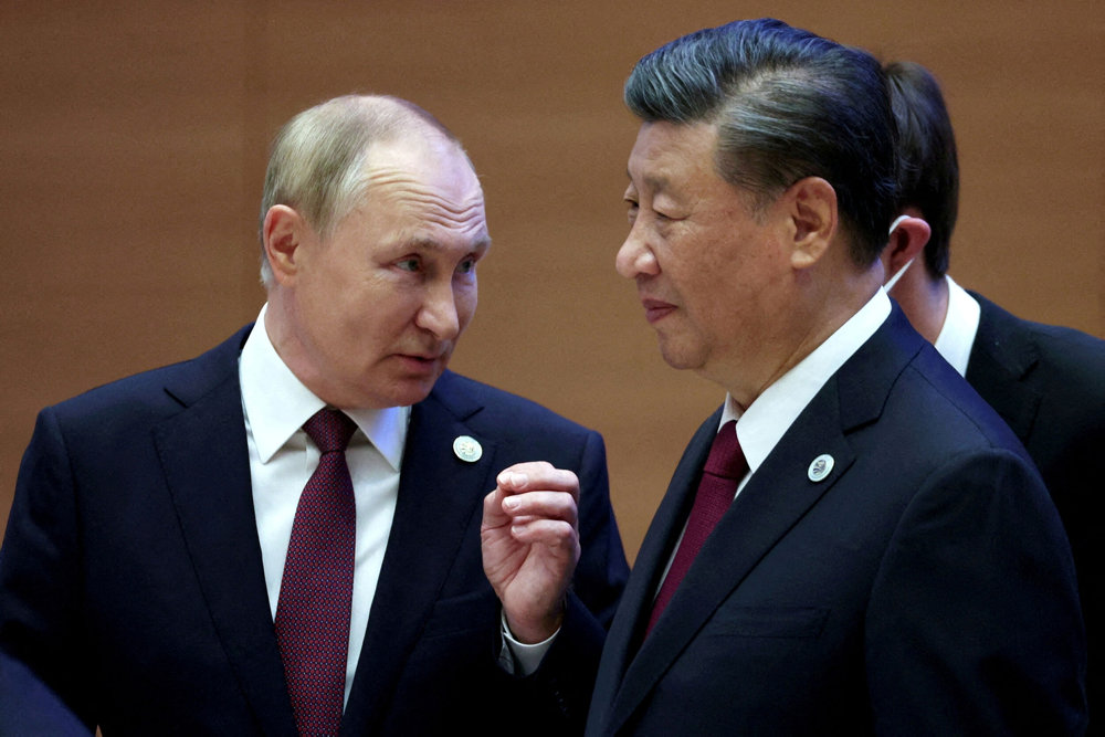 FILE PHOTO: China''s Xi plans Russia visit as soon as next week - sources