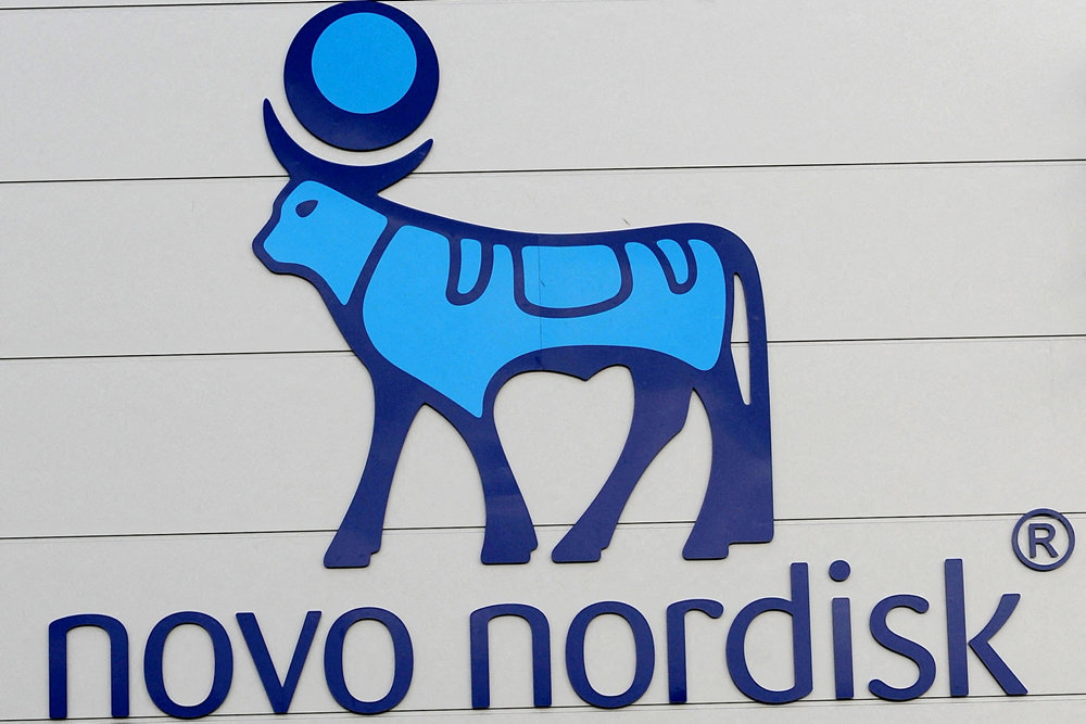 FILE PHOTO: The logo of Danish multinational pharmaceutical company Novo Nordisk is pictured on the facade of a production plant in Chartres