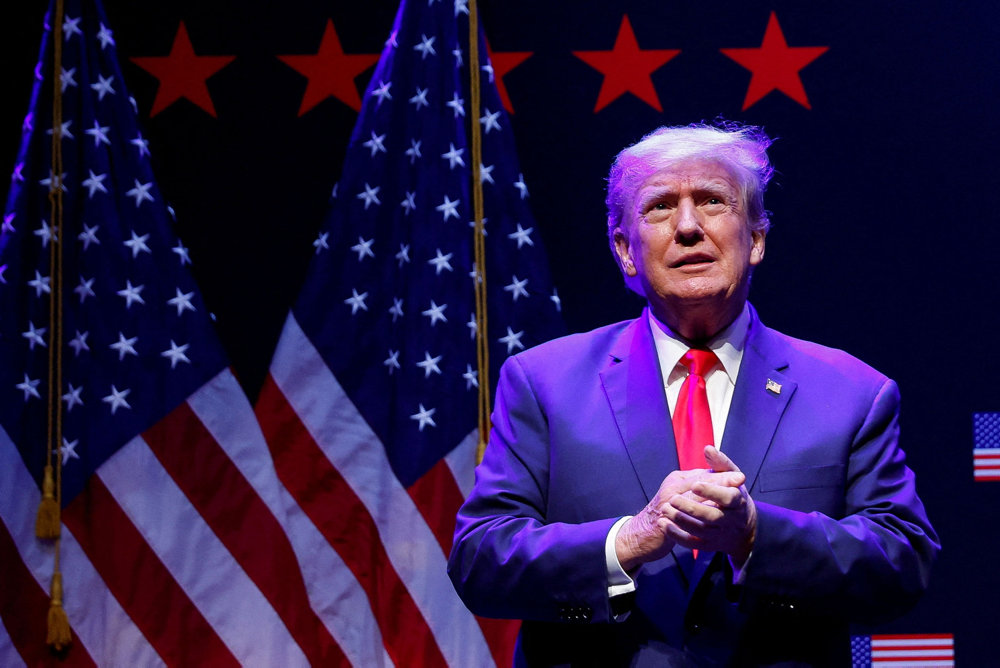 FILE PHOTO: Former U.S. President Trump holds a campaign rally in Davenport, Iowa