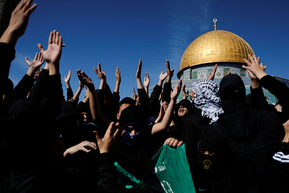 FILE PHOTO: Palestinians protest recent activity in Gaza in front of the Dome of the Rock, in Jerusalem''s Old City