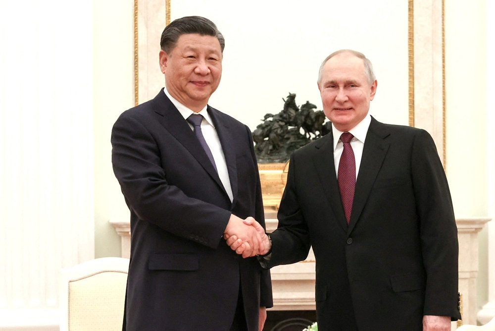 Russia''s Putin holds talks with China''s Xi in Moscow