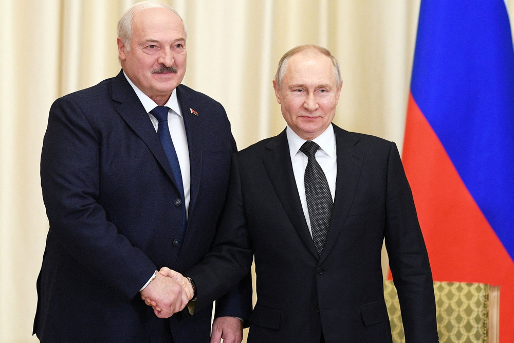 FILE PHOTO: Russian President Vladimir Putin meets with Belarusian President Alexander Lukashenko outside Moscow