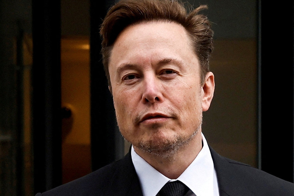 FILE PHOTO: Tesla CEO Musk departs the company''s local office in Washington