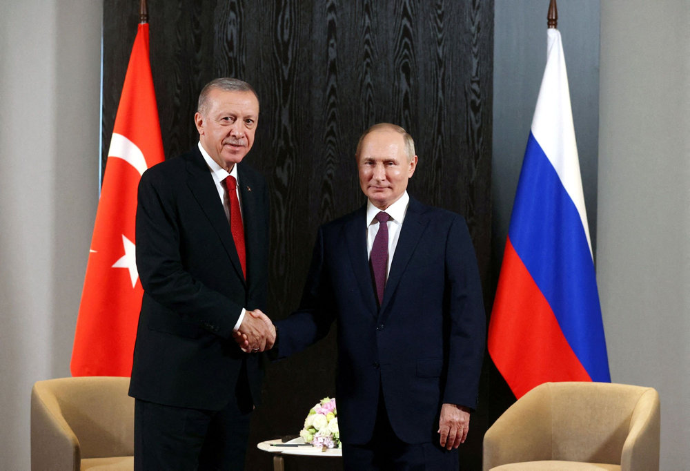 FILE PHOTO: Russian President Putin and Turkish President Erdogan meet in Samarkand