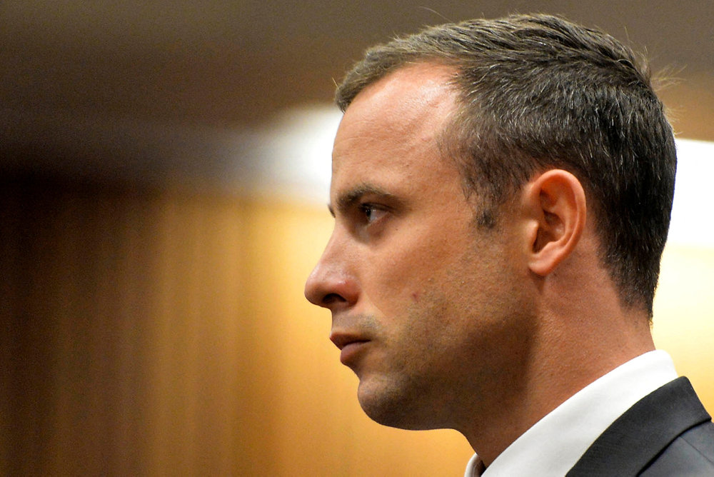 FILE PHOTO: Pistorius stands in the dock during his trial at the North Gauteng High Court in Pretoria