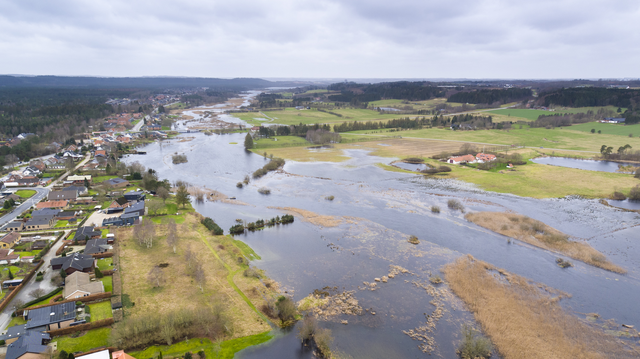 Gudenåen er flere gange gået over sine breder. Med klimaforandringerne, vil det ske oftere. Det kræver nye tilgange til bl.a. byggeri. Foto. Region Midtjylland.