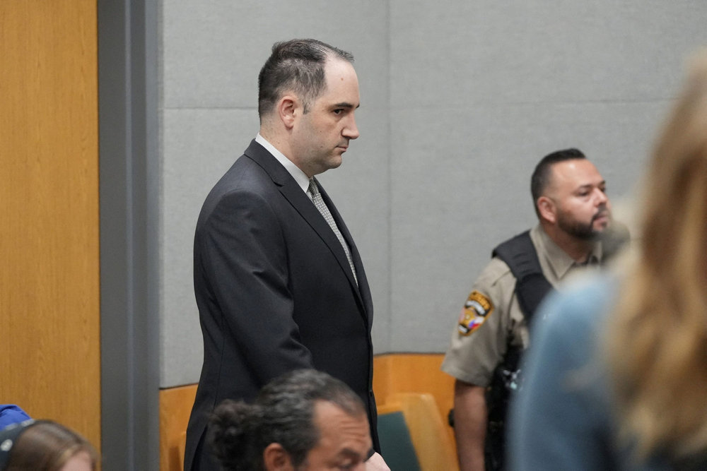 Daniel Perry walks into the courtroom moments before he was convicted of the murder of Garrett Foster in Austin