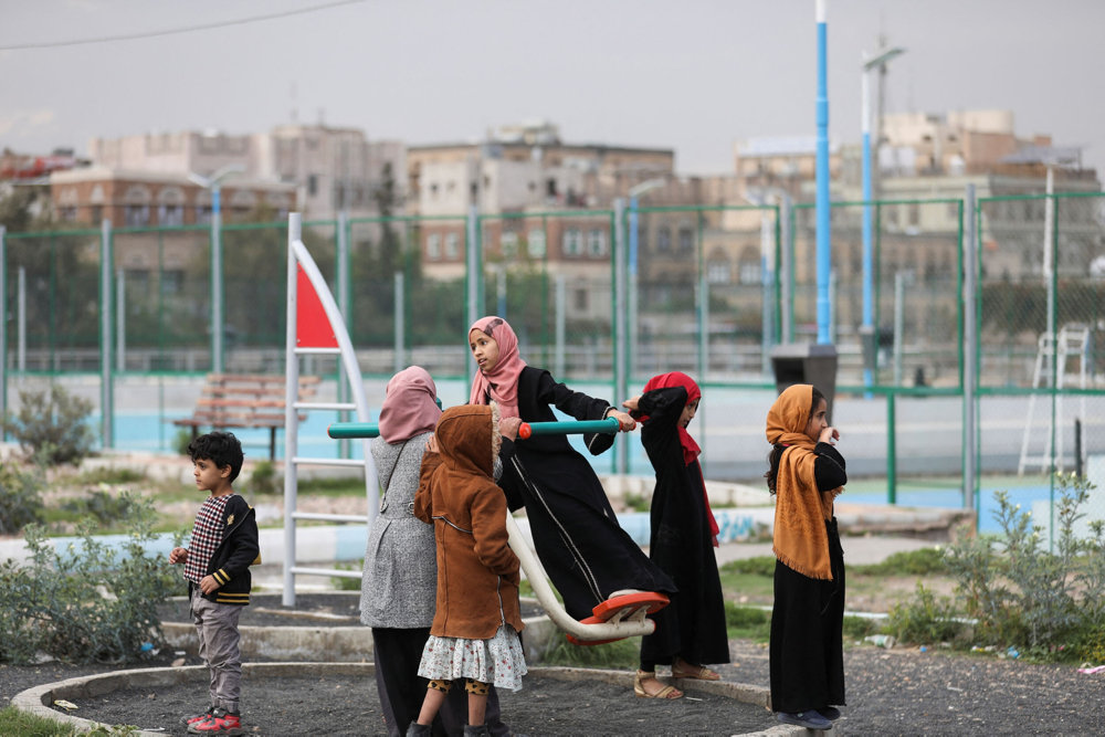 Children play at a park as Yemenis live the atmosphere of Ramadan in Sanaa