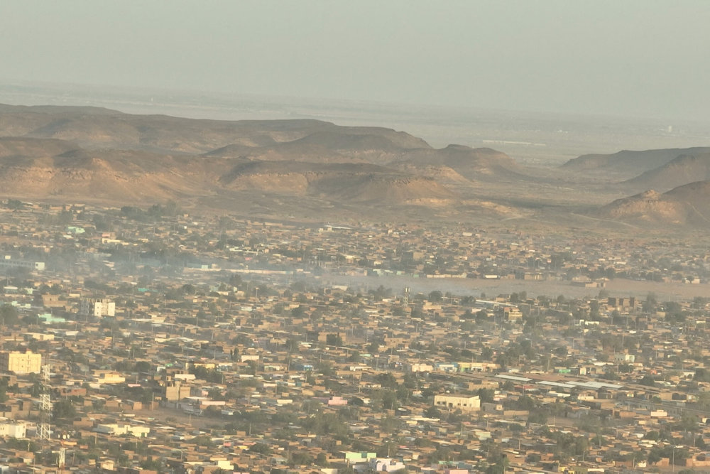 Plumes of smoke rises over the city of Omdurman