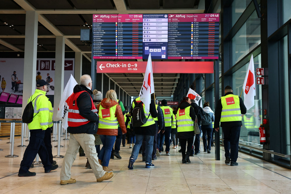 Airport workers protest at BER airport during a strike called by German trade union Verdi, in Berlin