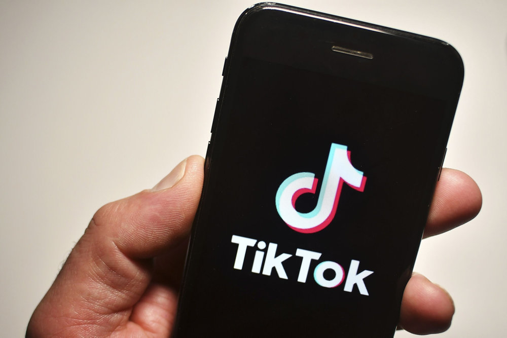 TikTok, social network, mobile app, logo, emblem, mobile phone