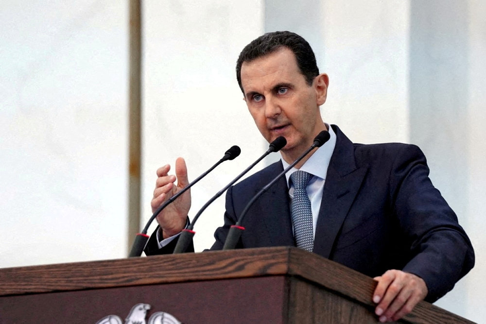 FILE PHOTO: Syria''s President Bashar al-Assad addresses the new members of parliament in Damascus