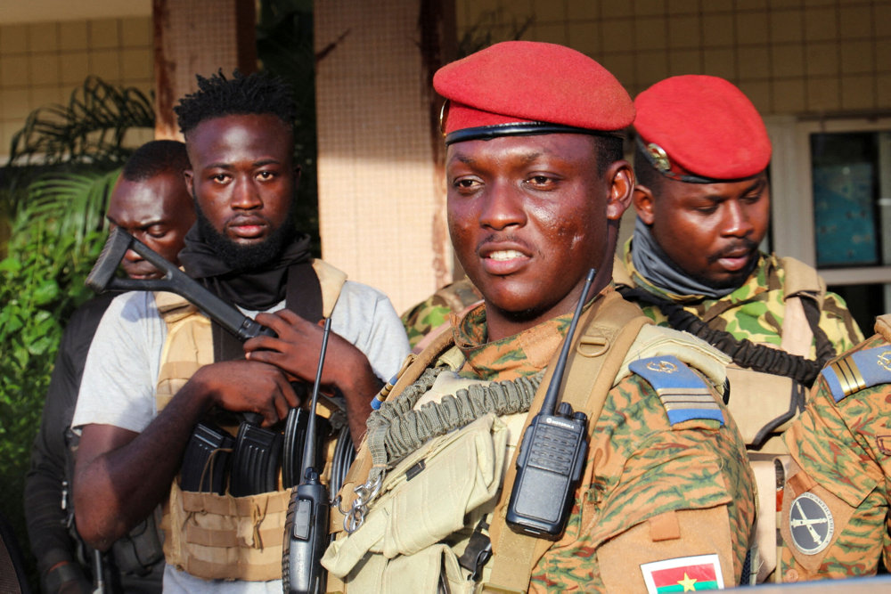 FILE PHOTO: Burkina Faso''s new military leader Ibrahim Traore is escorted by soldiers in Ouagadougou