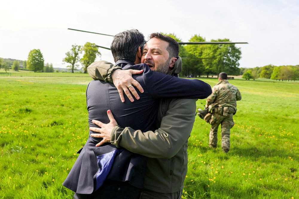 British PM Sunak hugs Ukrainian President Zelenskiy in Aylesbury