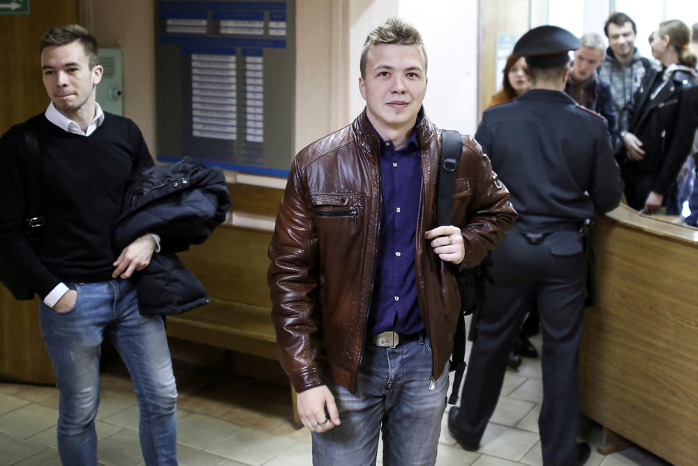 FILE PHOTO:Opposition blogger and activist Roman Protasevich arrives for a court hearing in Minsk