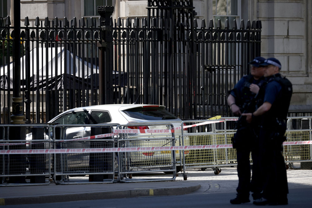 Car crashes into front gates of Downing Street in London