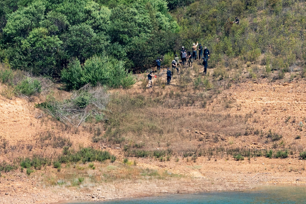 Police officers search dam for Madeleine McCann''s remains in Silves