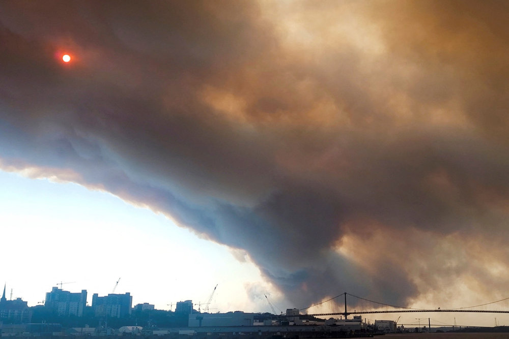 Smoke rises from a wildfire, in Halifax