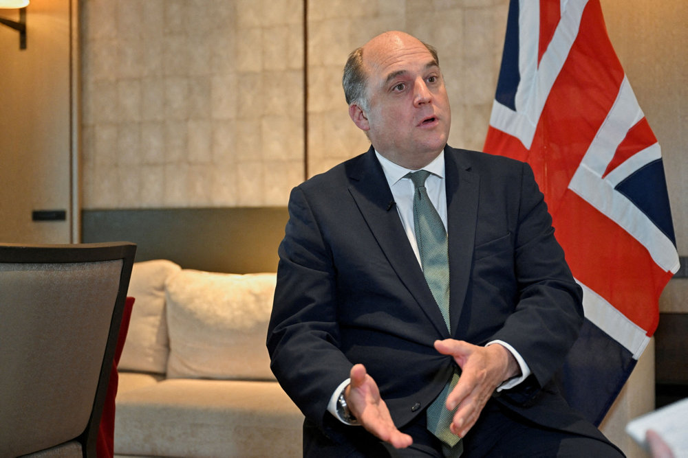 British Secretary of State for Defence Ben Wallace, speaks during an interview with Reuters in Singapore