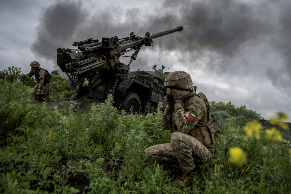 FILE PHOTO: Ukrainian service members fire a Caesar self-propelled howitzer towards Russian troops near Avdiivka