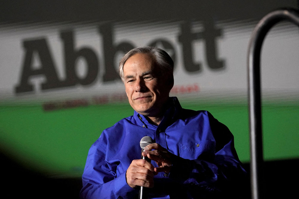 FILE PHOTO: Republican Texas Governor Greg Abbott speaks in Conroe