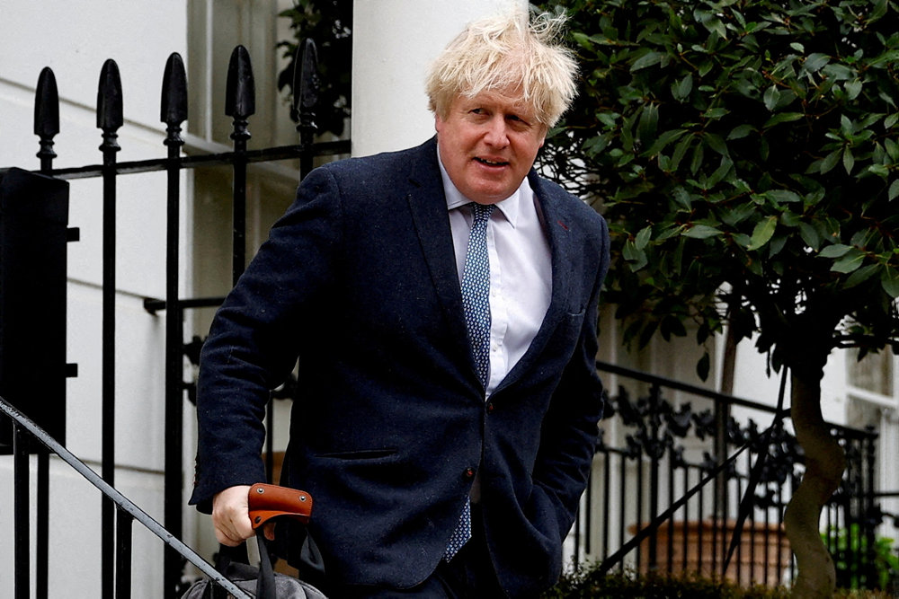 FILE PHOTO: Former British Prime Minister Boris Johnson leaves his home, in London