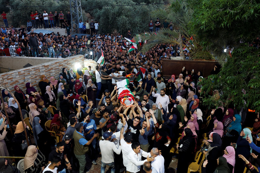 Funeral of a Palestinian who was killed during clashes following Israeli settlers'' attack, near Ramallah