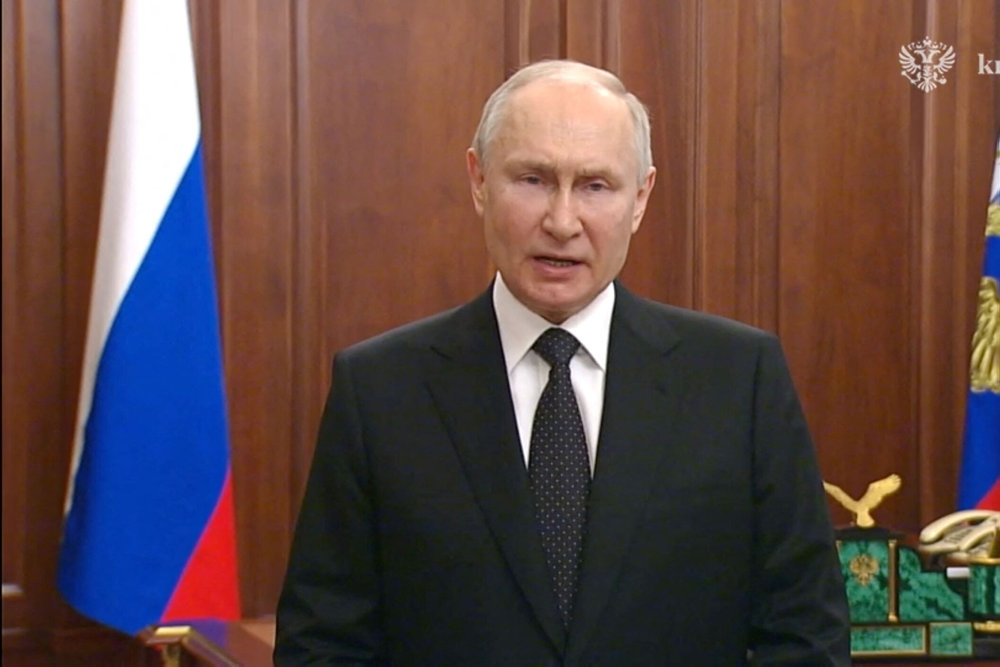 Russian President Vladimir Putin gives a televised address in Moscow