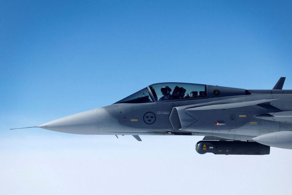 A Swedish Air Force Saab JAS 39 Gripen fighter jet flies during a media day