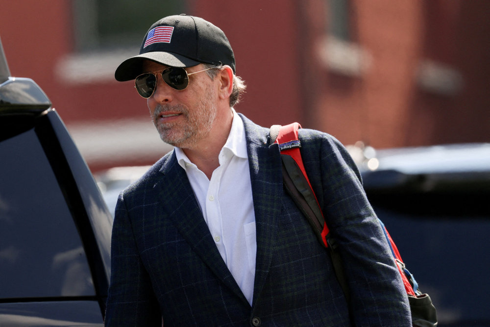 FILE PHOTO: Hunter Biden walks to the motorcade after arriving at Fort McNair