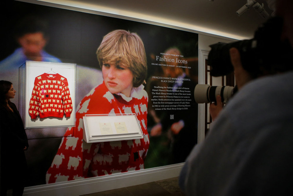 A ''black sheep'' jumper worn by Britain''s late Diana, Princess of Wales, goes up for auction at Sotheby''s, in London