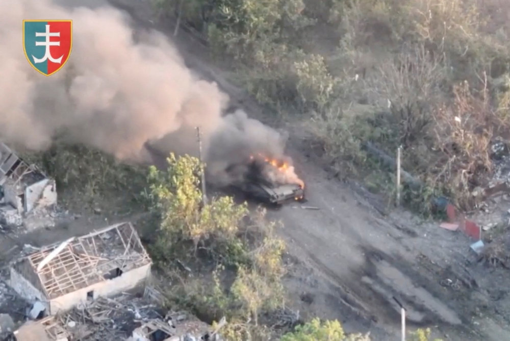 Tank burns as Ukrainian Armed Forces members liberated the town of Staromaiorske