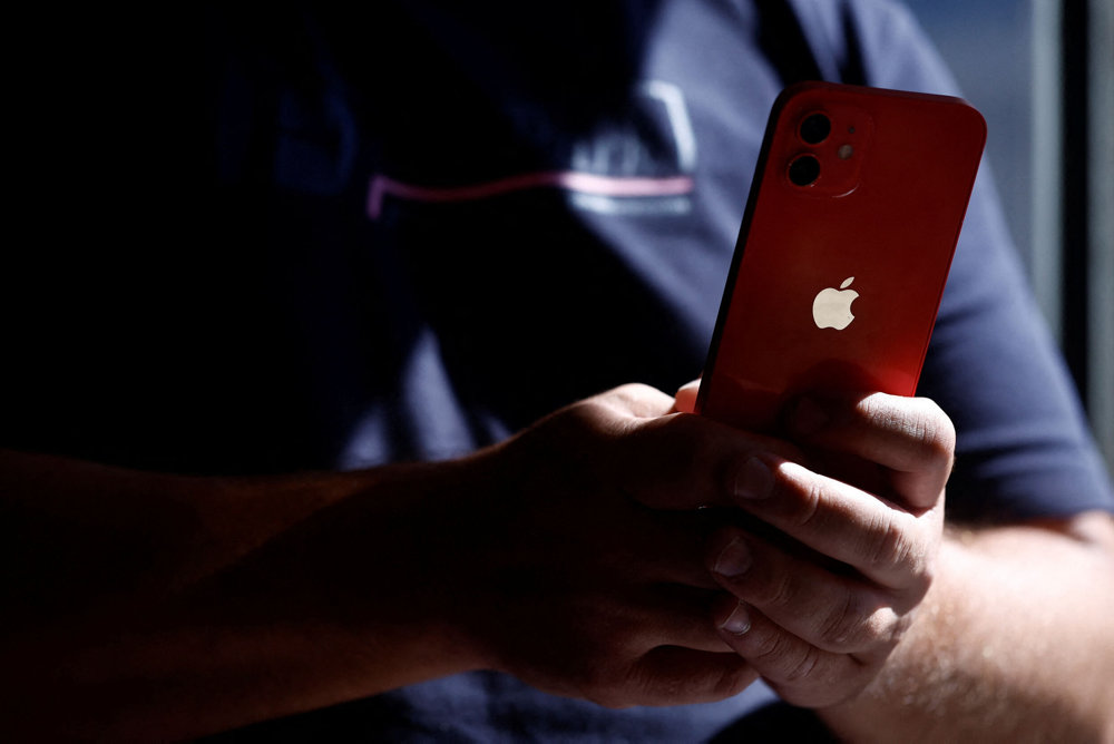 An Apple iPhone 12 in a mobile phone store in Nantes