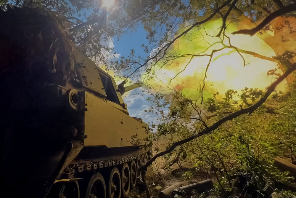 Ukrainian servicemen fire a M109 self-propelled howitzer towards Russian troops in Donetsk region