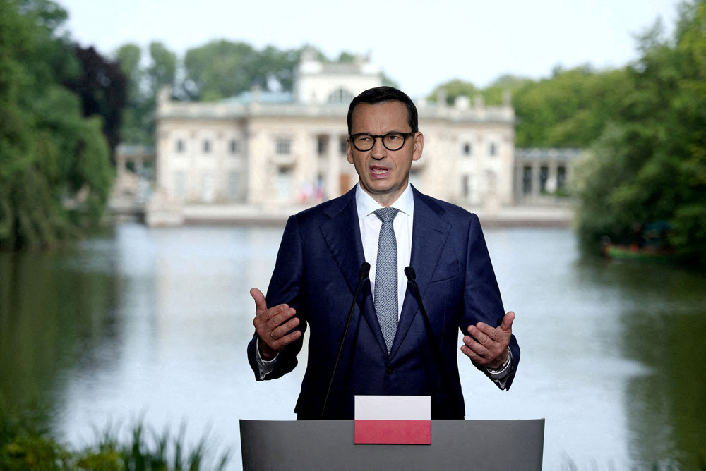 FILE PHOTO: Polish Prime Minister Mateusz Morawiecki addresses a press conference in Warsaw, Poland