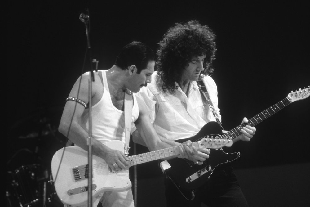 Freddie Mercury, Brian May of Queen