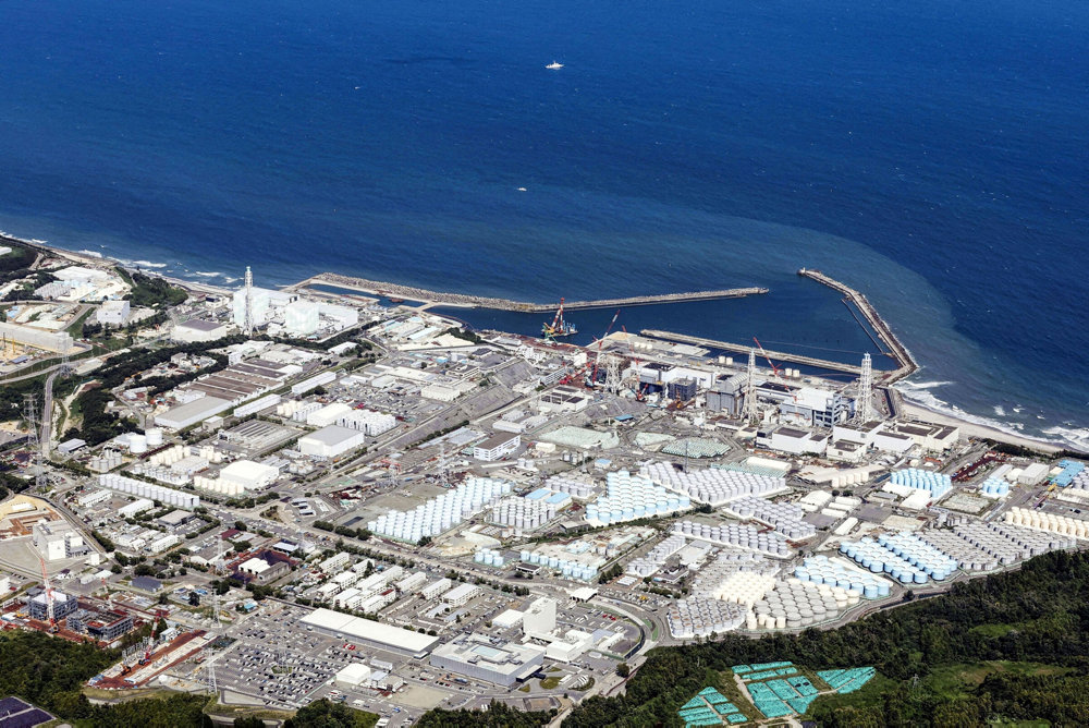 FILE PHOTO: An aerial view shows the tsunami-crippled Fukushima Daiichi nuclear power plant which started releasing treated radioactive water into the Pacific Ocean, in Okuma town