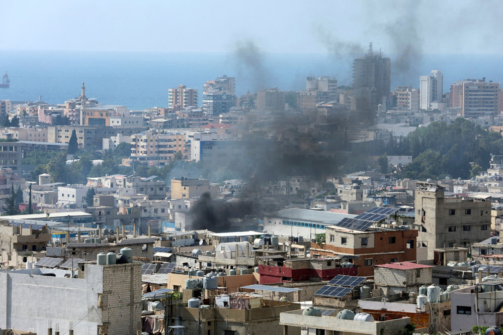 FILE PHOTO: Smoke rises from Ain el-Hilweh Palestinian refugee camp
