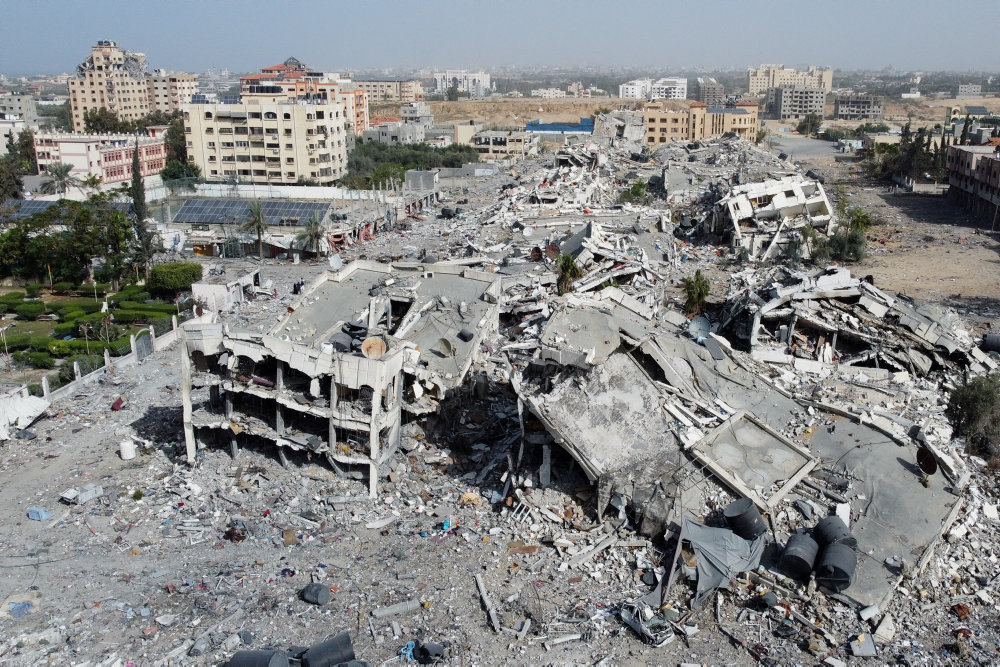 Residential buildings, destroyed in Israeli strikes during the conflict, lie in ruin, in Gaza City