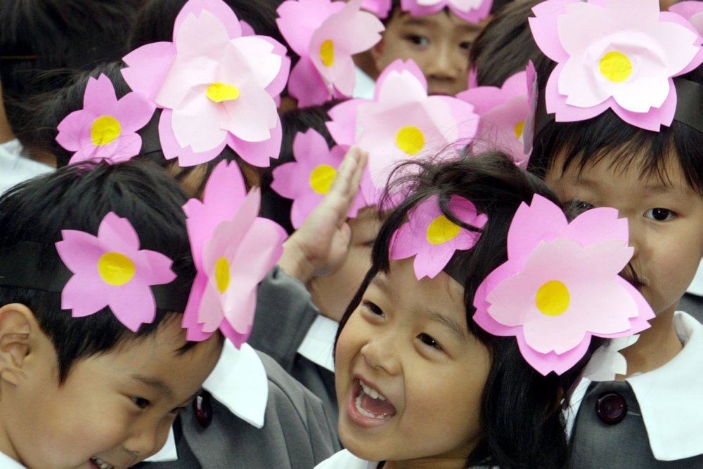 JAPANESE CHILDREN WEAR FLOWER CROWNS TO CELEBARATE BUDDHA''S BIRTHDAY AT SENSOJI TEMPLE IN TOKYO
